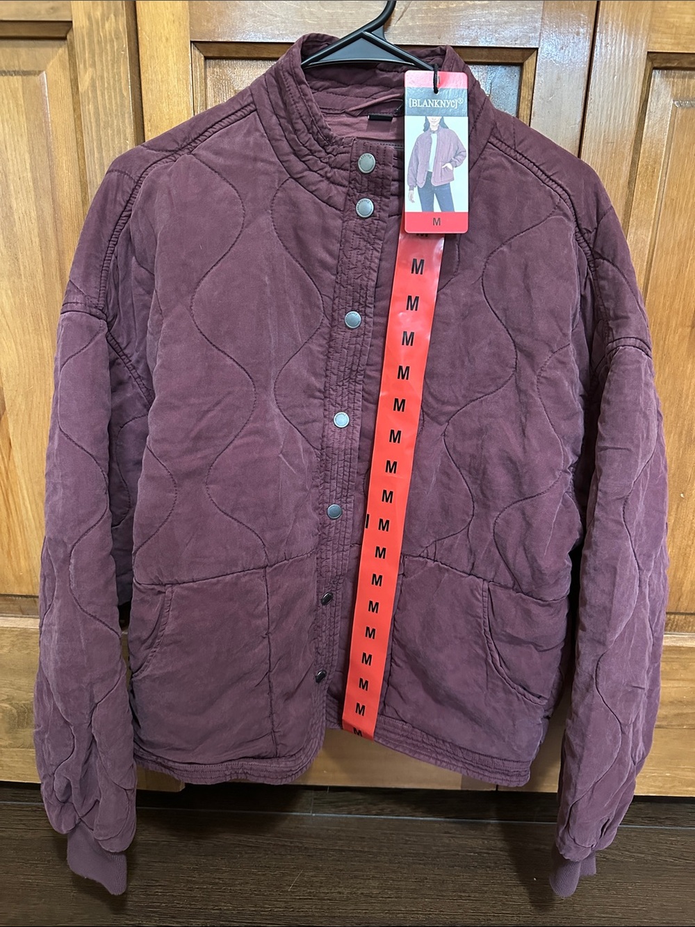 Blank NYC women’s Quilted Jacket in burgundy